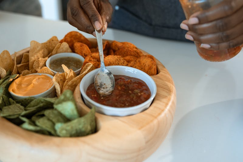 Cheese dip with tortilla chips for sharing