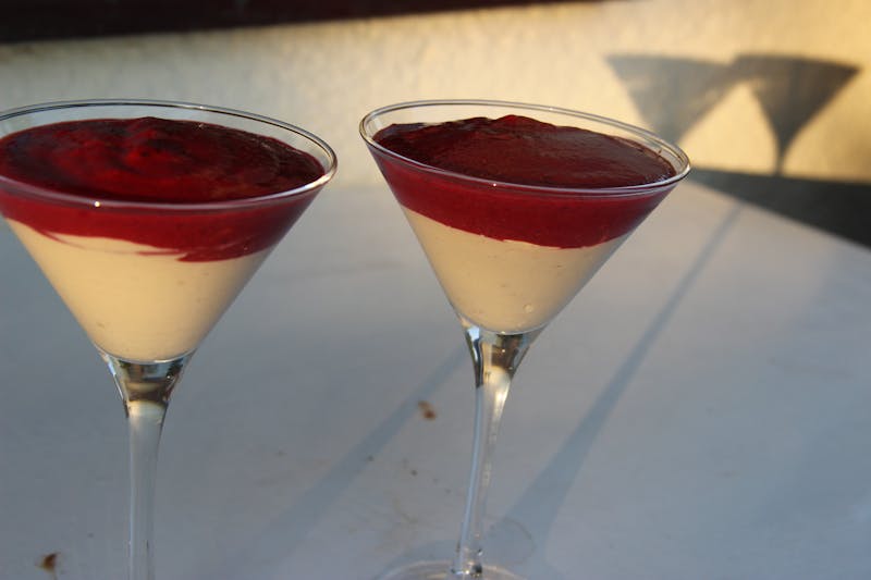 Panna cotta with berry coulis and fresh mint
